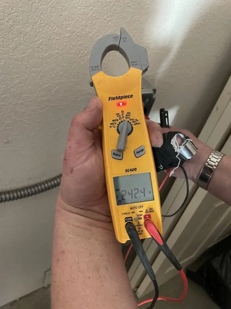 Voltage testing with clamp meter during Generator Installation in Rose Hill